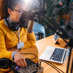 Woman creating a podcast, creating digital media